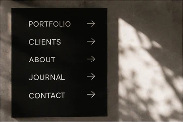 Minimal portfolio navigation board styled as a premium editorial layout